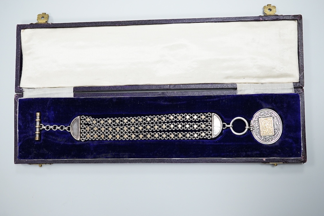 A cased Middle Eastern medallion